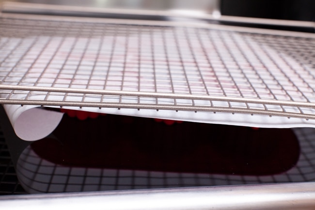 Heart Shaped Chocolate Cake from thelittlekitchen.net cooling rack with parchment paper