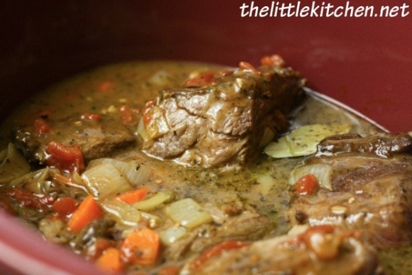 Add wine sauce, chicken broth & bay leaves