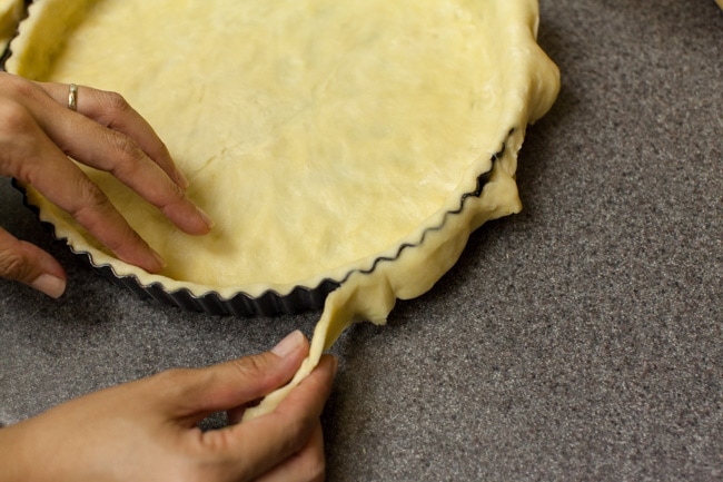 Trimming edges of Sugar Pie crust from edges of tart pan Trimming edges of Sugar Pie crust from edges of tart pan